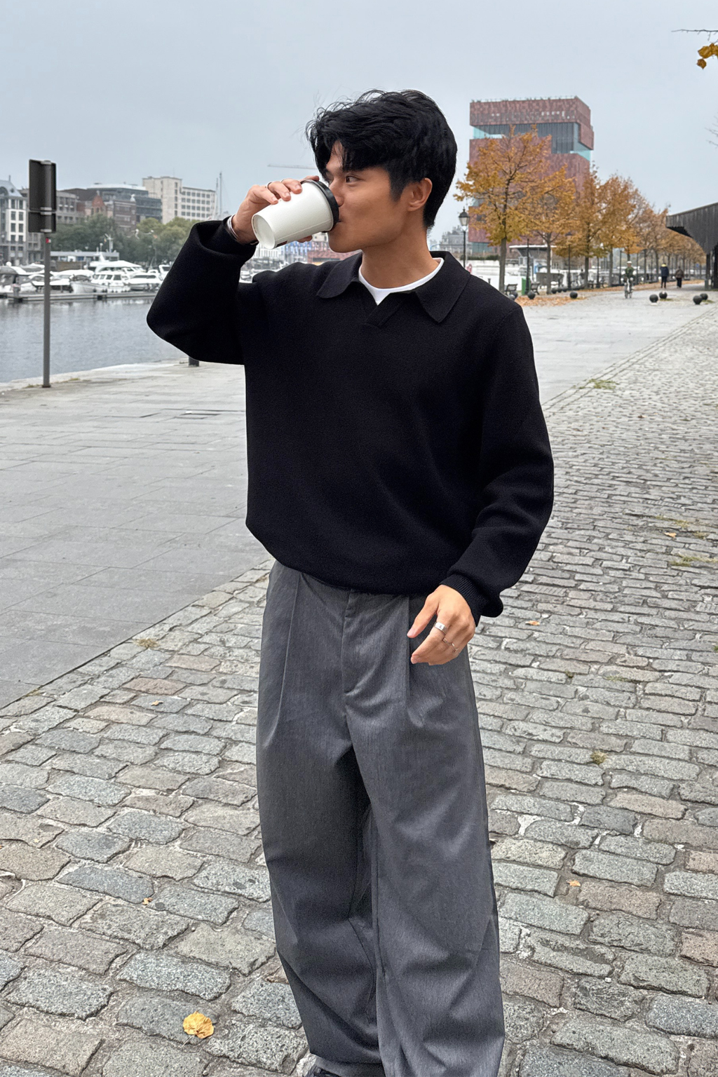 Polo muinchille fada cniotáilte - dubh