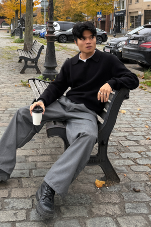 Polo muinchille fada cniotáilte - dubh