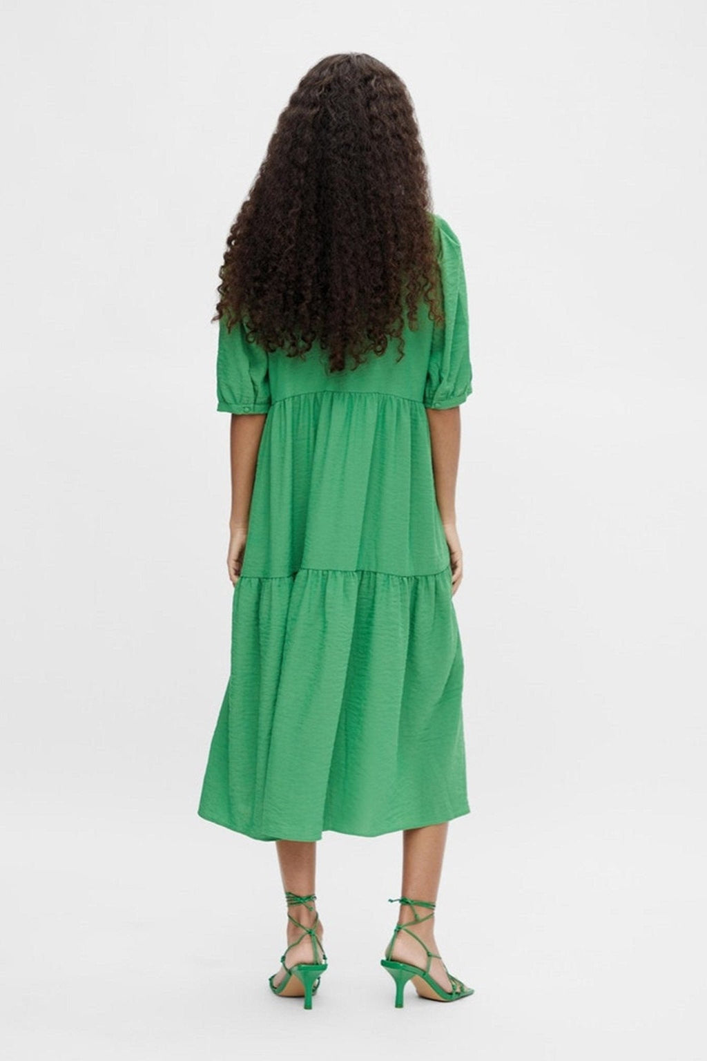 artichoke green dress WEDDING TREND Bridesmaid dresses change the look and feel of the photos. We loved these mismatched green floral dresses Kathleen's bridesmaids picked. Loving the pattern in pattern look. Bridesmaid dresses are from @